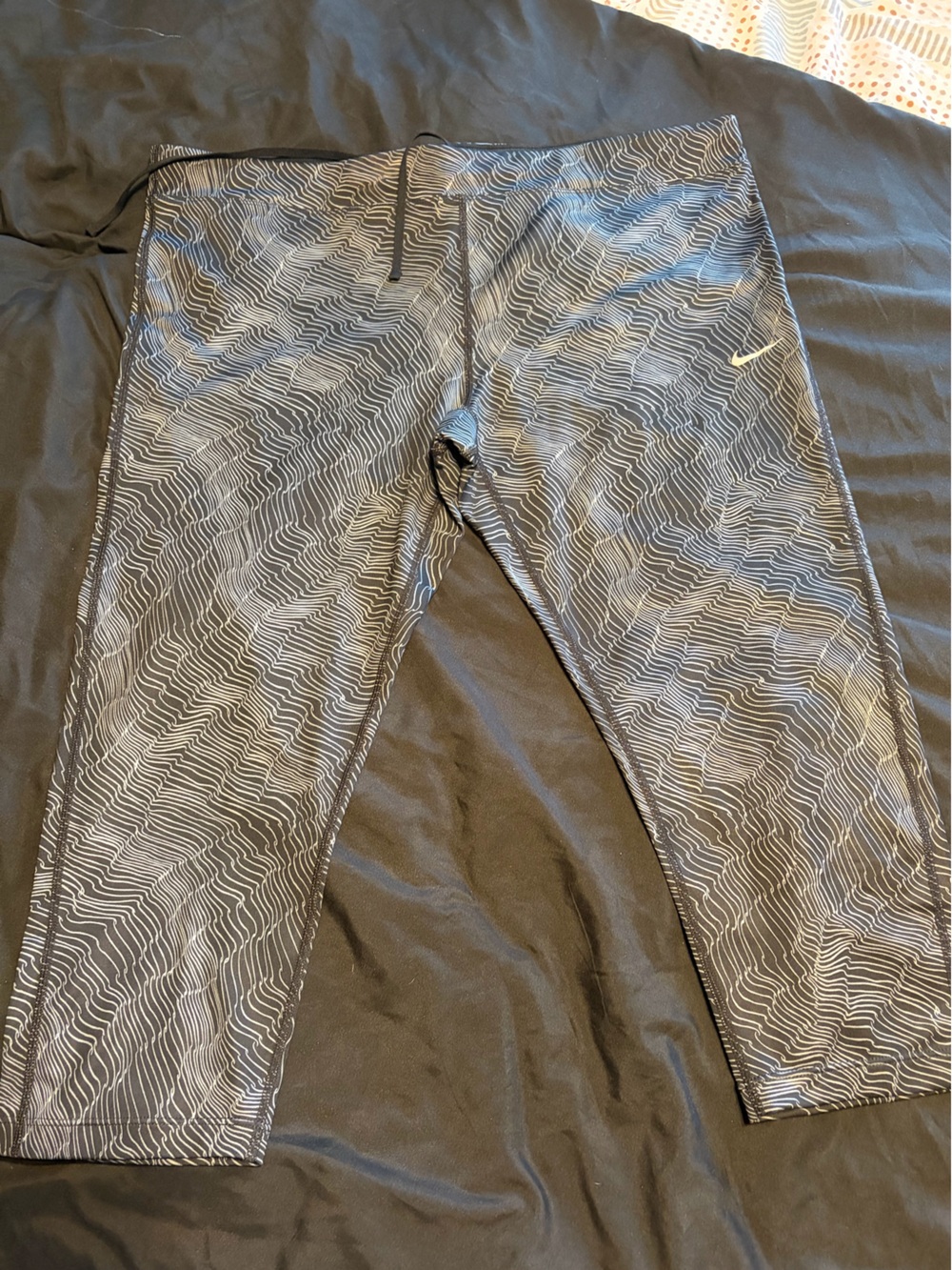 Nike Men's Black Joggers with White Wave Line Pattern